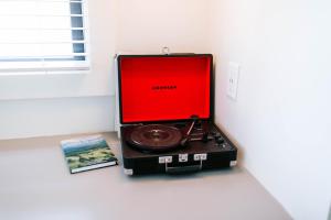 a radio sitting on a counter next to a book at Luxe 2br Cabin D By Mhm Luxury Properties in Jasper