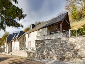 a stone house with a slate roof at Luxury Pool Villa in Sosoye in Sosoye +32 photos