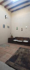 a room with a room with benches in a room with at Rayen hue in Esquel