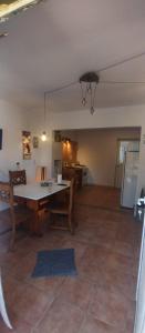 a large room with a table and chairs in it at Rayen hue in Esquel