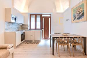 Η κουζίνα ή μικρή κουζίνα στο Casa di Armanda +12 φωτογραφίες