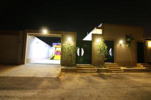 Fațada sau intrarea în Dorrat Al Nakheel Chalet