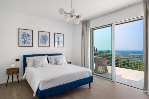 Postel nebo postele na pokoji v ubytování THE VIEW Boutique Rooms and Breakfast - Adults Only + 24 fotografií