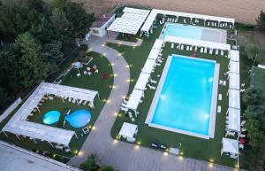 an overhead view of a swimming pool in a yard at Tenuta Lo Cuoccio in Gravina in Puglia