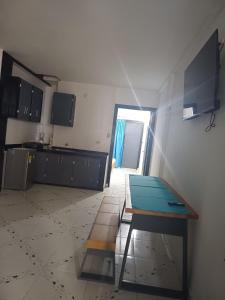 TV a/nebo společenská místnost v ubytování Casa Vacanze Cenaida Tucán