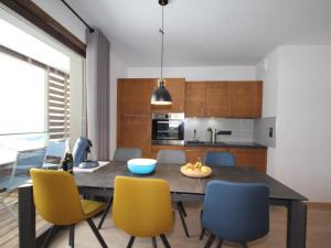 Η κουζίνα ή μικρή κουζίνα στο Les Saisies : Appartement neuf, 6 pers, 3*, 2 ch, Animaux admis, Parking - FR-1-293-240 +8 φωτογραφίες