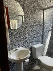 O baie la Pousada GH - Centro da cidade próximo ao Thermas
