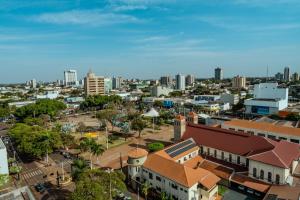 a city view of a city with tall buildings at Terraço Flat Hotel in Dourados