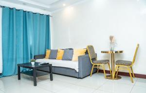 Un lugar para sentarse en Résidence GIGI HOME