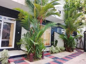 Κήπος έξω από το One-plus Holiday Homes Mirissa