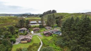 an aerial view of a home on a hill at Scarba in Balvicar