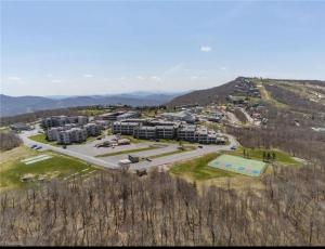 an aerial view of a large apartment complex with buildings at Beech Mountain Getaway in Beech Mountain
