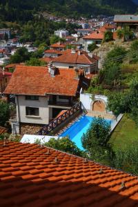 a view from the roof of a house with a swimming pool at Mountain View ECOVILLA in Devin