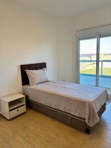 Postel nebo postele na pokoji v ubytování Rio Grande apartmento Av primeiro de Maio 820 apartment 301