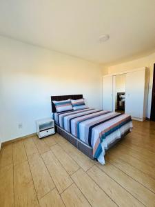 Postel nebo postele na pokoji v ubytování Rio Grande apartmento Av primeiro de Maio 820 apartment 301 + 3 fotografie