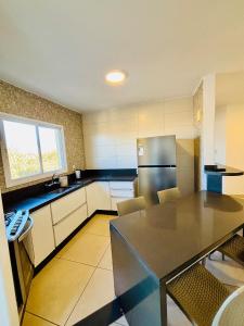 Kuchyň nebo kuchyňský kout v ubytování Rio Grande apartmento Av primeiro de Maio 820 apartment 301