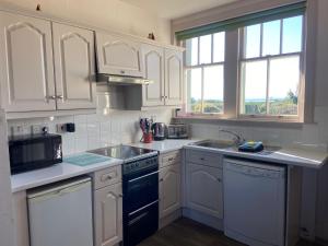 Kuchyň nebo kuchyňský kout v ubytování Sypsies Cottage + 6 fotografií