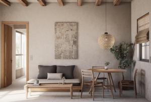 a living room with a couch and a table at Elion Villas in Kos Town