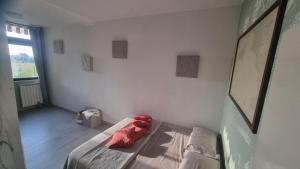 Ένα ή περισσότερα κρεβάτια σε δωμάτιο στο Casa Kundra Portiglioni +5 φωτογραφίες