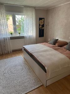 Postel nebo postele na pokoji v ubytování Ferienwohnung Riva