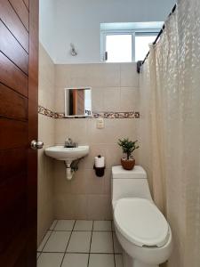 Koupelna v ubytování Hotel Real Juquilita