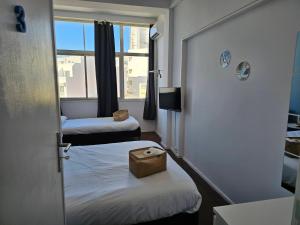 Un pat sau paturi într-o cameră la Blife Europya - private rooms at Santantonya 3rd floor