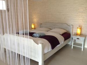 Postel nebo postele na pokoji v ubytování bnb Valais - by La Sittelle
