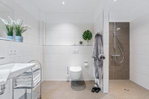 Ένα μπάνιο στο Ferienwohnung Strandperle, App 3 Olpenitz +23 φωτογραφίες