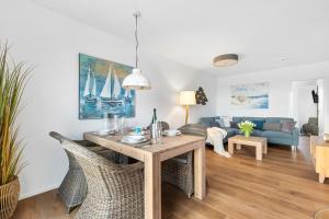 Posezení v ubytování Ferienhaus Kaptains Strandhuus Olpenitz
