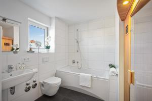 Koupelna v ubytování Ferienhaus Kaptains Strandhuus Olpenitz + 19 fotografií
