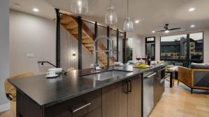 a kitchen with a sink and a counter top at Borough House in Steamboat Springs