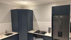 Η κουζίνα ή μικρή κουζίνα στο 10 Bond Square