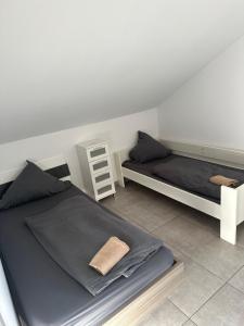 Postel nebo postele na pokoji v ubytování 3 Zimmer Wohnung mit Balkon und Parkplatz