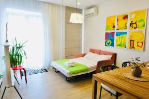 Кровать или кровати в номере Old Batumi City Center Cozy Apartment