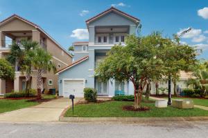 a house with a parking meter in front of it at Stella Maris in Perdido Key