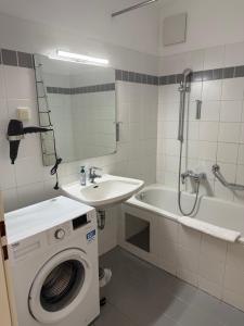 Ένα μπάνιο στο Traumhafte Terrassen Wohnung am Wienerberg