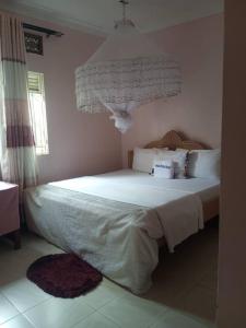 Postel nebo postele na pokoji v ubytování Gugga Resort Hotel