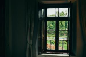 Κήπος έξω από το Pousada Don Giovanni