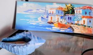 a painting of a painting of a boat at Parginaki House in Parga