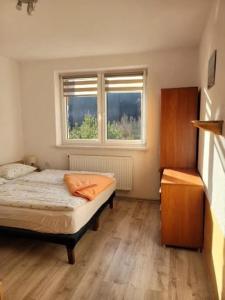 Katil atau katil-katil dalam bilik di Zagroda Studzienno & Agroturystyka