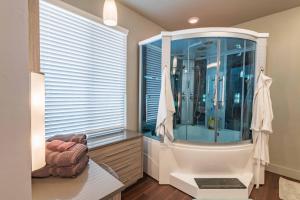 a bathroom with a shower and a window at Red River Retreat in Paso Robles +44 photos