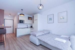 Kuchyň nebo kuchyňský kout v ubytování Urban Residence + 18 fotografií