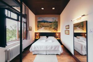 Ένα ή περισσότερα κρεβάτια σε δωμάτιο στο Pousada Don Giovanni +23 φωτογραφίες