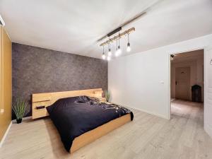 Postel nebo postele na pokoji v ubytování Maison toute cosy à la campagne