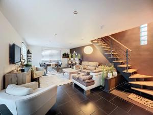 Posezení v ubytování Maison toute cosy à la campagne