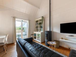 TV a/nebo společenská místnost v ubytování Nieuwendamme H114