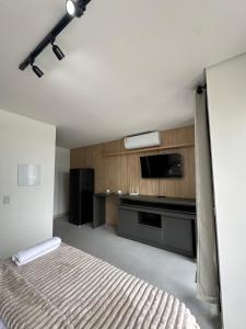 Η κουζίνα ή μικρή κουζίνα στο Flat no Vieralves +9 φωτογραφίες