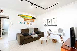 TV a/nebo společenská místnost v ubytování Condomínio Portinari