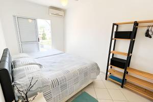 Postel nebo postele na pokoji v ubytování Condomínio Portinari + 251 fotografií