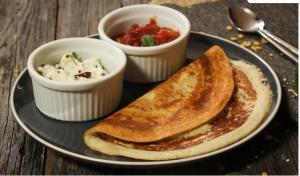 a plate of food with toast and a bowl of dips at Rio Vista in Rāzole
